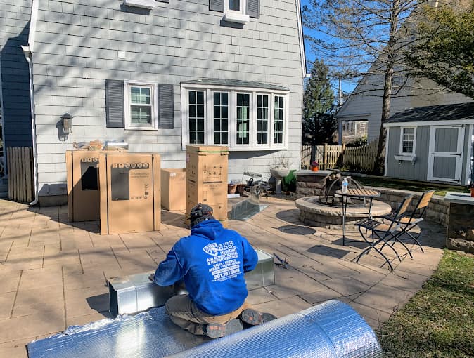 Air2Cool HVAC technician performing professional ductwork installation