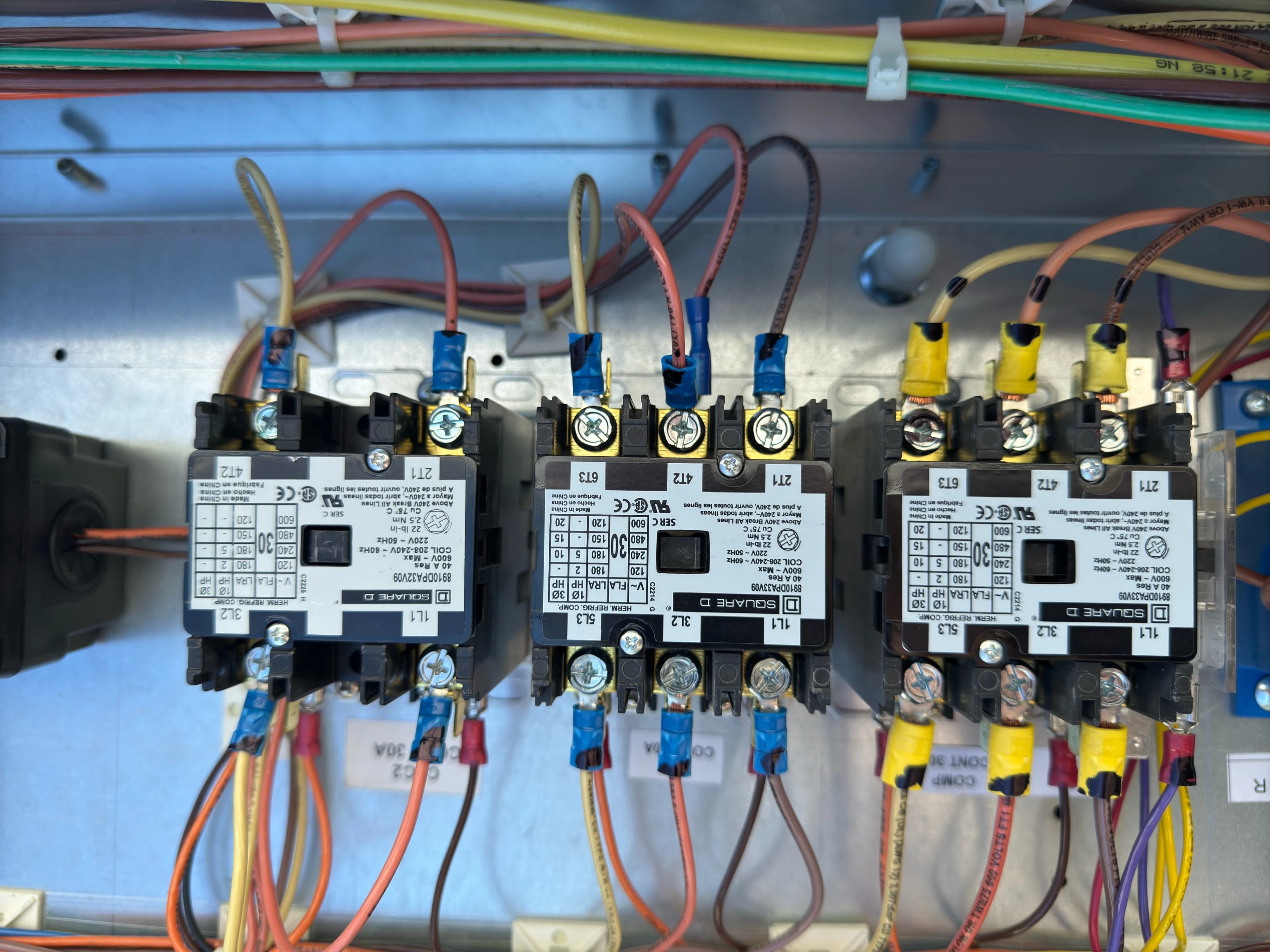 HVAC control panel electrical contactors wiring closeup — Air2Cool NJ